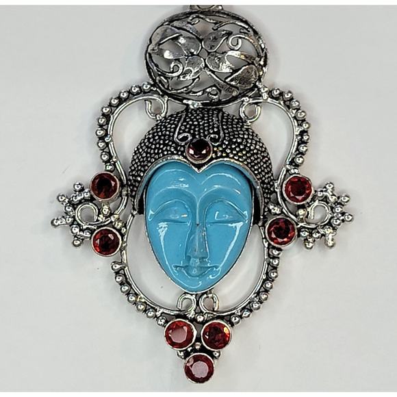 Sterling Silver Pendant with Blue Carved Face and Garnet Accents - Picture 1 of 12